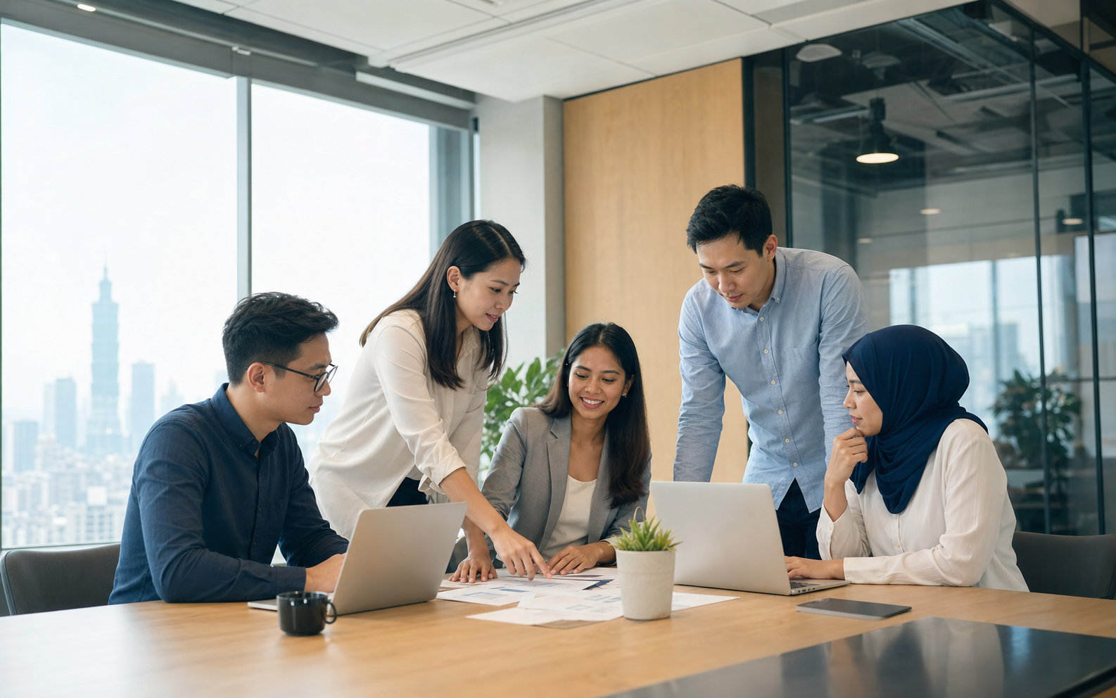 KUFUN team collaborating in a modern office